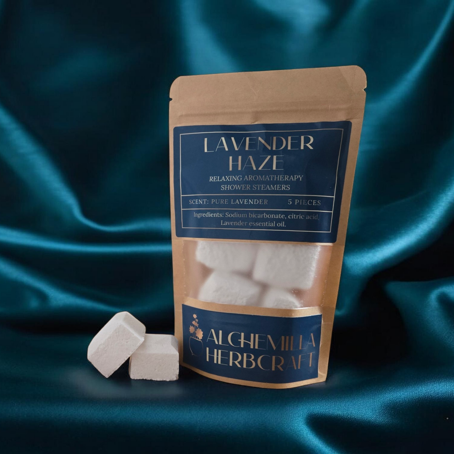 Lavender shower steamers on a blue fabric background