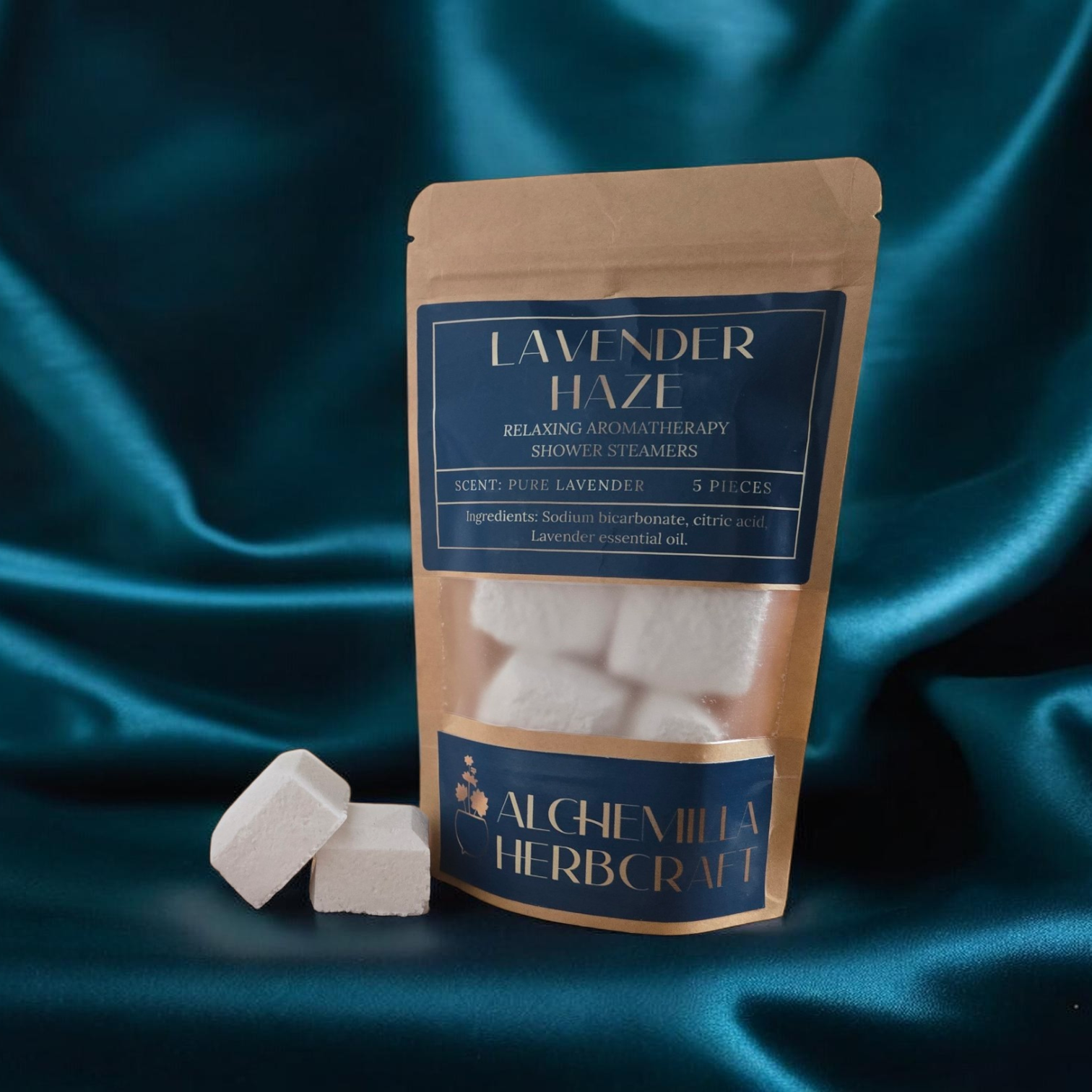 Lavender shower steamers on a blue fabric background