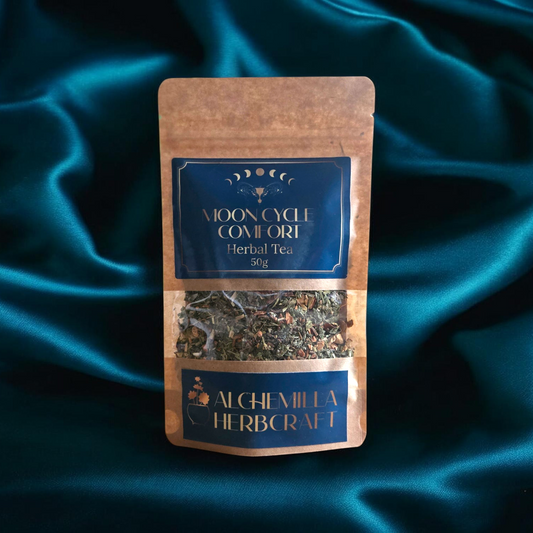A herbal tea for women on a blue fabric