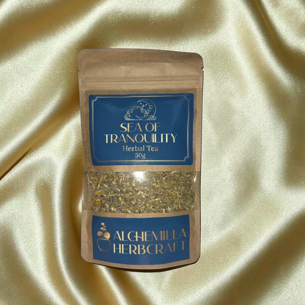 A blend of sleepy time herbal tea on a gold fabric
